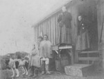People Alaska Standing in Front of a Building by George Fox University Archives