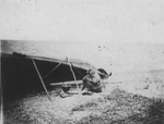 Native Alaskan Man Under a Canoe by George Fox University Archives