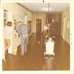 Custodial cleans downstairs in Wood Mar by George Fox University Archives
