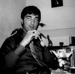 Barry Hubbell eats and ice cream sundae by George Fox University Archives