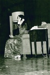 Actress performs on stage with telephone by George Fox University Archives