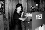 Staff member works in office by George Fox University Archives