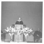 Man Speaking Behind a Podium at the Fall Convocation of 1972 by George Fox University Archives