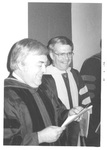 Two Men Talking at the Fall Convocation in 1974 by George Fox University Archives