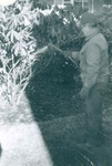 Calvin Hull from Physical Plant waters plants by George Fox University Archives