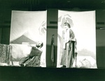 Male and female actors perform on stage by George Fox University Archives