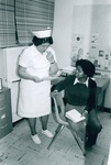 Campus Nurse Carolyn Staples in Pennington Health Office by George Fox University Archives