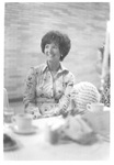 Woman Sitting at Alumni Dinner by George Fox University Archives