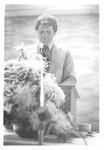 Man Speaking Behind a Podium at a Class Reunion by George Fox University Archives