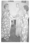Women Standing and Talking at a Class Reunion by George Fox University Archives