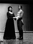 Male and female students sing duet in play by George Fox University Archives