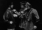 Two actors point to a third actor in performance by George Fox University Archives