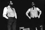 Two male actors perform together on stage by George Fox University Archives