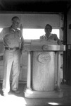 Bill Loewen, Bookstore Wood Carver, with Ron Crecelius, Chaplain, at Podium Bill made for chapels by George Fox University Archives