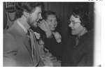 Woman Greeting a Man at an Alumni Reception by George Fox University Archives