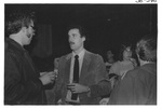 Two Men Talking to Each Other at an Alumni Reception by George Fox University Archives