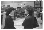 Two Women Talking at an Alumni Reception by George Fox University Archives
