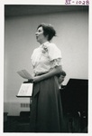 Woman Performing at an Alumni Reunion by George Fox University Archives