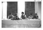 People Sitting at a Table at an Alumni Reception by George Fox University Archives