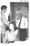Man Presenting a Plaque at an Alumni Reception by George Fox University Archives