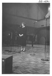 Woman Singing Onstage at the Alumni Talent Show in 1983 by George Fox University Archives