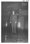 Man Performing at the Alumni Talent Show in 1983 by George Fox University Archives