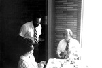 Bill Jackson greeting Ed Stevens and wife by George Fox University Archives
