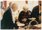 Women Getting Food at The Class of 1937 50th Reunion in 1987 by George Fox University Archives