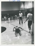 Men Playing at the Alumni Volleyball Game by George Fox University Archives