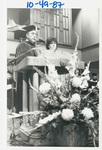 People behind a Podium at the Fall Convocation in October 1978 by George Fox University Archives