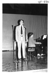Man Singing in the Alumni Talent Show in 1985 by George Fox University Archives