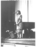 Woman Performing at the Alumni Talent Show in 1987 by George Fox University Archives