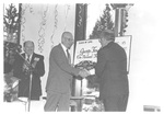 Men Shaking Hands at The Class of 1943 Reunion at Homecoming 1993 February by George Fox University Archives