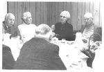 Alumni Sitting and Eating at The Class of 1943 50th Reunion Banquet by George Fox University Archives
