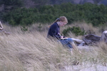Student Reads on the Beach by George Fox University Archives