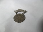 100 Yard Dash Medal by George Fox University Archives