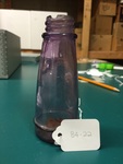 Purple Glass Bottle by George Fox University Archives