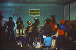 Earl Perisho Opening Gifts, Kotzebue, AK, Spring 1976